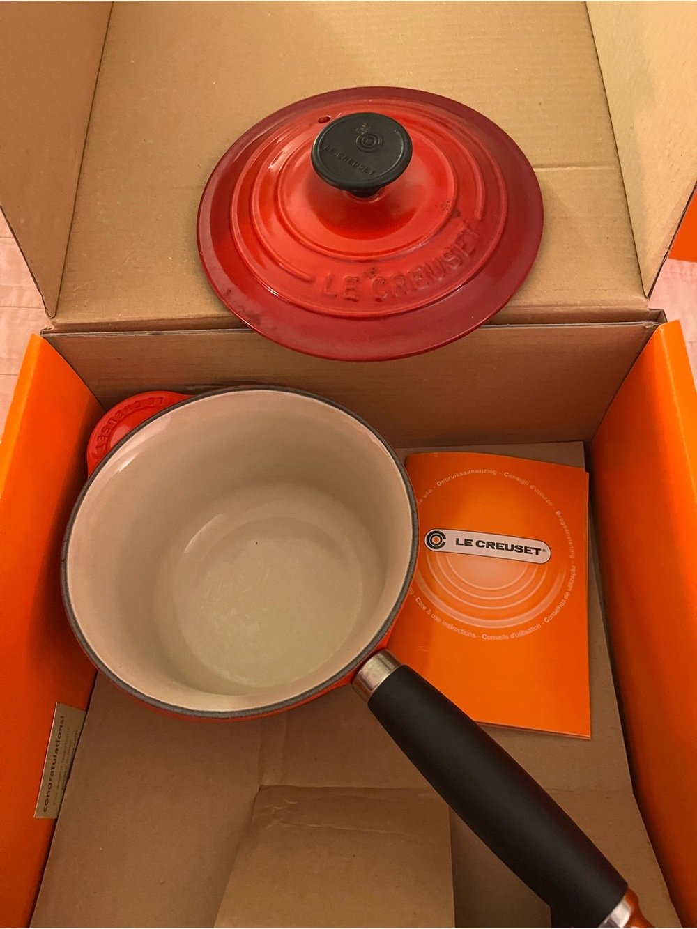 Le Creuset Orange-Red Enamel Saucepan with Lid